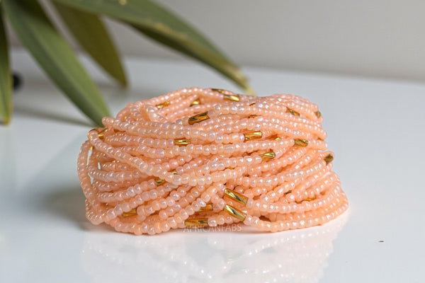 Waist Beads / Afrikaanse Heupketting -  Ogbe -  Perzik / goud (Traditioneel niet-elastisch koord)