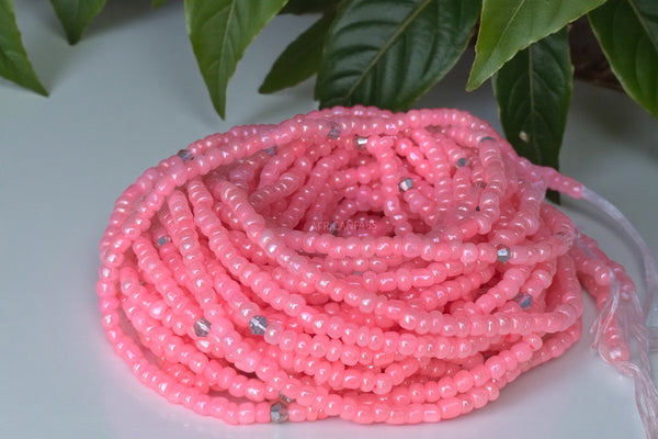 (Belangrijk: graag lezen) Waist Beads / Afrikaanse Heupketting - O - Roze (Traditioneel niet-elastisch koord)