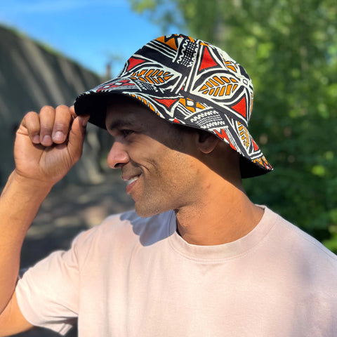 Bucket hat / Vissershoedje met Afrikaanse print - Rood & Oranje Bogolan Symbols - Kinderen & Volwassenen (Unisex)