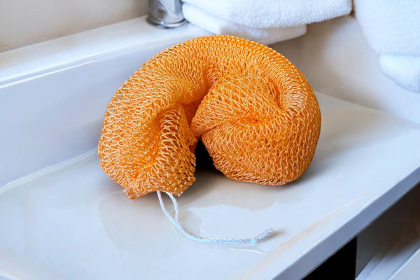 Afrikaanse spons / net sponge - traditionele SAPO spons / scrub spons - Perzik