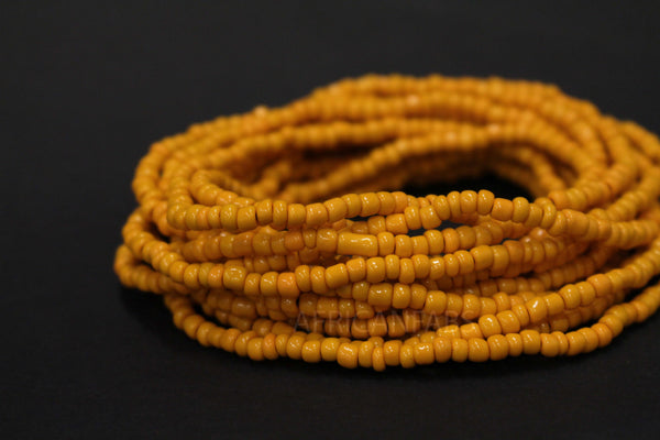 Waist Beads / Afrikaanse Heupketting - AIGBE - Okergeel (elastisch)