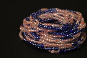 Waist Beads / Afrikaanse Heupketting - OSAYEMWENRE - Blauw / roze (elastisch)