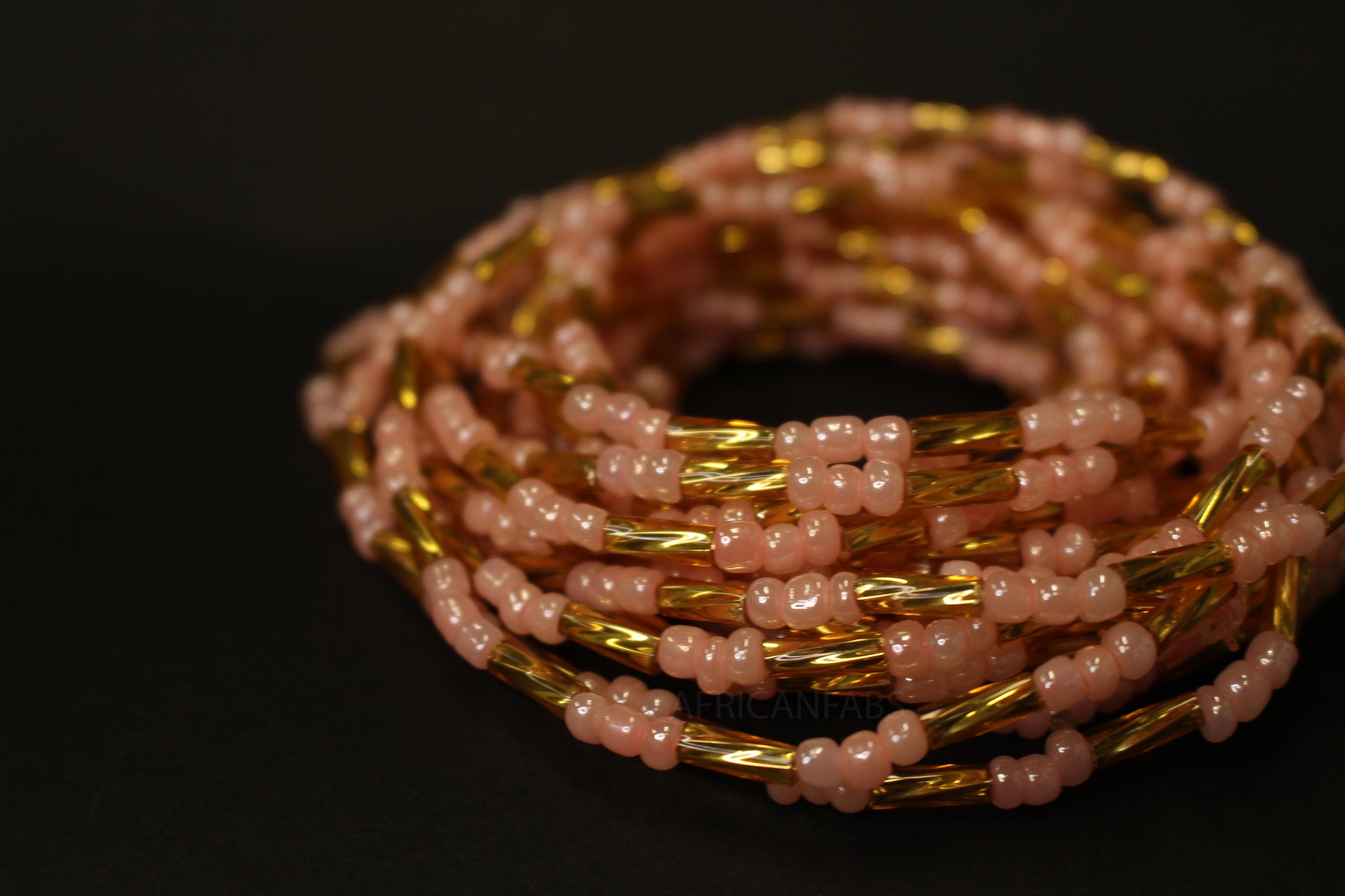 Waist Beads / Afrikaanse Heupketting - AGBUZA - Roze / goud (elastisch)